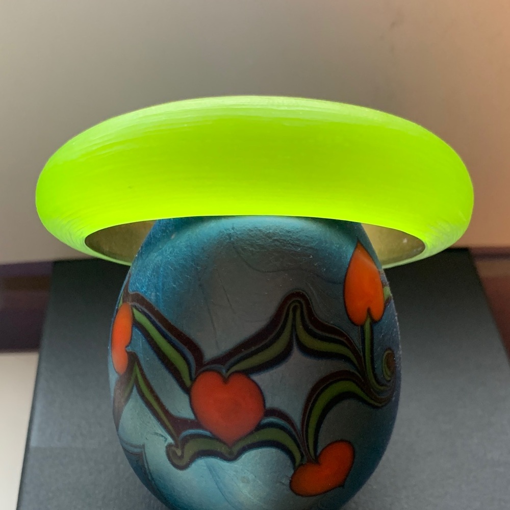 Alexis Bittar neon tapered bangle
Approximately 2 1/2 in interior diameter.
